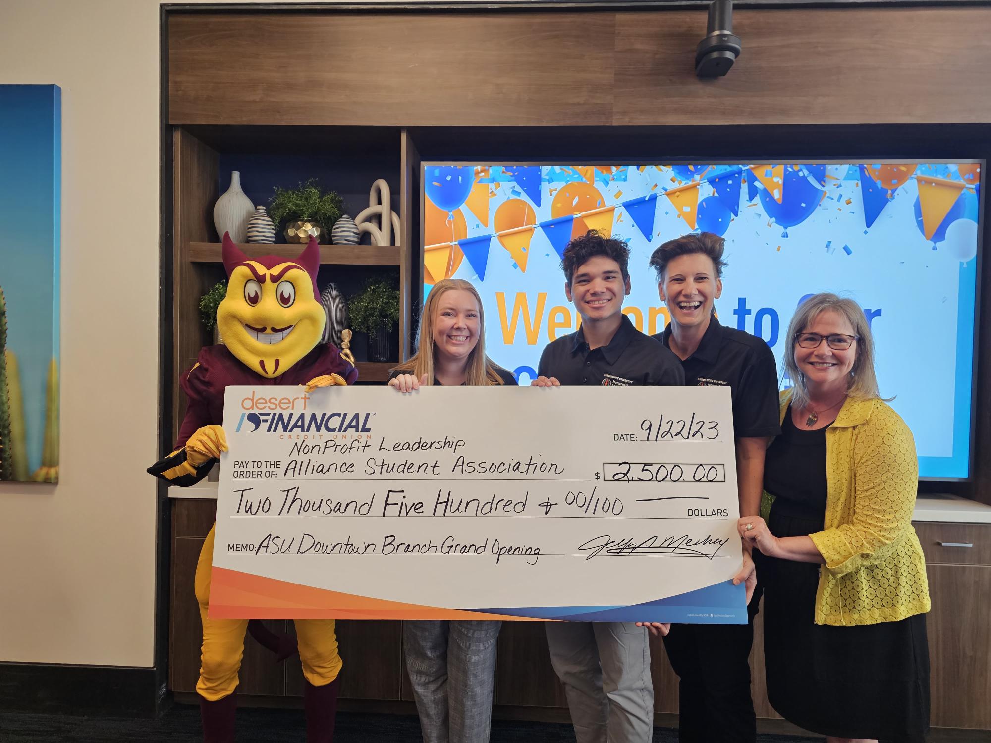 Sparky and Dean Amy Golden with NLASA students Emma Gibbs and Raine McAngus and advisor Anne Kotleba